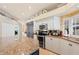 Well-appointed kitchen with stainless steel appliances and an island with a breakfast bar at 511 Duque Rd, Lutz, FL 33549