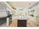 Gourmet kitchen with an island, stainless steel appliances, and custom cabinetry at 511 Duque Rd, Lutz, FL 33549