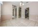 Open dining space with tile floors, flowing seamlessly into other living areas at 5283 Bevens Ave, Spring Hill, FL 34608
