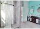 Modern bathroom featuring a walk-in shower with decorative gray tile at 538 Crystal Dr, Madeira Beach, FL 33708