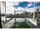 Personal boat lift offering convenient waterfront access, adding value and ease to boating activities at 538 Crystal Dr, Madeira Beach, FL 33708