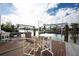 Private boat dock featuring a table with chairs and easy access to waterfront activities at 538 Crystal Dr, Madeira Beach, FL 33708