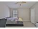This cozy bedroom offers natural light from a window and a spacious closet for storage at 5717 Fishhawk Ridge Dr, Lithia, FL 33547