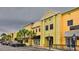 Commercial building frontage in a shopping center with businesses, ample parking, and pedestrian-friendly walkways at 5717 Fishhawk Ridge Dr, Lithia, FL 33547