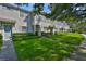 Attractive townhome with well-manicured lawn and sidewalks at 5717 Fishhawk Ridge Dr, Lithia, FL 33547