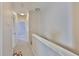 Upstairs hallway with neutral walls, carpet, and doorways to rooms at 5717 Fishhawk Ridge Dr, Lithia, FL 33547