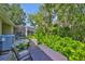 Cozy patio with table, chairs, and lush greenery for peaceful relaxation at 5717 Fishhawk Ridge Dr, Lithia, FL 33547