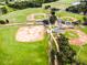 Aerial view of baseball fields with well-maintained grass, lights, and convenient access pathways for players and spectators at 5717 Fishhawk Ridge Dr, Lithia, FL 33547