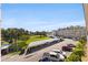 View from the condo building hallway showcasing parking and complex at 5725 80Th N St # 301, St Petersburg, FL 33709