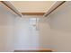 Bright, walk-in closet with carpet and rack for hanging clothes at 5725 80Th N St # 301, St Petersburg, FL 33709