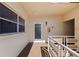Hallway showing the entrance to unit 301 at 5725 80Th N St # 301, St Petersburg, FL 33709