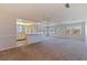 Open living space with kitchen bar, tiled floor, and great natural light at 5725 80Th N St # 301, St Petersburg, FL 33709