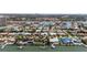 Stunning aerial view of waterfront homes with private docks and lush landscaping in a desirable neighborhood at 5884 51St S St, St Petersburg, FL 33715