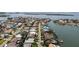 Panoramic aerial view of a residential neighborhood featuring charming homes, pools, and access to waterways at 5884 51St S St, St Petersburg, FL 33715