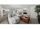 Spacious living room with an open layout, featuring modern furnishings and a seamless flow to the kitchen at 5884 51St S St, St Petersburg, FL 33715