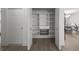 Well-organized pantry with adjustable shelves, drawers and wire baskets for optimal storage convenience at 5884 51St S St, St Petersburg, FL 33715