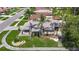 Charming single-story home with lush landscaping and two palm trees in the front yard at 6001 Lemon Tree Ct, Tampa, FL 33625