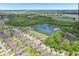 Breathtaking aerial shot of a well-planned community surrounded by lakes and natural green spaces at 636 Chatham Walk Dr, Ruskin, FL 33570
