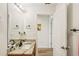This bathroom offers great storage, updated granite countertops and an updated faucet at 636 Chatham Walk Dr, Ruskin, FL 33570