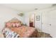 Bedroom view showcasing ensuite bathroom and hardwood floors at 636 Chatham Walk Dr, Ruskin, FL 33570