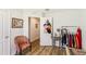 This dressing room offers wood floors and a great organizational system for hats and clothes at 636 Chatham Walk Dr, Ruskin, FL 33570