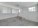 Bonus room features new carpeting, white shiplap walls, and updated windows at 6408 N Central Ave, Tampa, FL 33604