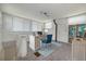 Home office features white shiplap walls, built-in shelving, and a desk area at 6408 N Central Ave, Tampa, FL 33604