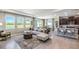 Open concept living room seamlessly connects to the kitchen and dining areas at 6653 Flint Creek Dr, Land O Lakes, FL 34638