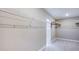 Spacious walk-in closet with white wire shelving, providing ample storage and organization solutions at 6697 Flint Creek Dr, Land O Lakes, FL 34638