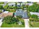 Beautiful aerial view of a well-maintained home, lush green backyard with inviting pool at 6844 34Th N Ave, St Petersburg, FL 33710