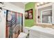 Bathroom featuring bright colors, unique art, and modern fixtures at 6844 34Th N Ave, St Petersburg, FL 33710