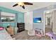 Bedroom with a closet, ceiling fan, window, and plenty of space at 6844 34Th N Ave, St Petersburg, FL 33710