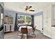 Dining area features a window overlooking the backyard, a ceiling fan, and built in storage at 6844 34Th N Ave, St Petersburg, FL 33710
