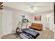 Bright workout room featuring modern equipment and a futon for post workout stretching at 6844 34Th N Ave, St Petersburg, FL 33710