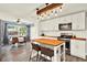 Bright kitchen with white cabinets, stainless steel appliances, and a center island with seating at 6844 34Th N Ave, St Petersburg, FL 33710