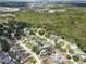 Aerial view displays the home's location within a mature, tree-lined neighborhood setting at 6865 Circle Creek Dr, Pinellas Park, FL 33781