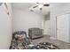 Bedroom or room with crib, ceiling fan, and neutral walls at 9816 Ivory Dr, Sun City Center, FL 33573