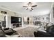 Spacious living room is open to the dining and kitchen areas and offers lots of natural light at 9816 Ivory Dr, Sun City Center, FL 33573