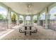 Outdoor pavilion with tables and chairs surrounded by arches at 9816 Ivory Dr, Sun City Center, FL 33573