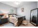Cozy bedroom with natural light, neutral walls, ceiling fan, and carpet at 10436 Villa View Cir, Tampa, FL 33647