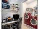 Laundry room combined with office space at 10436 Villa View Cir, Tampa, FL 33647