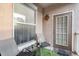 Cozy outdoor patio with comfortable seating, perfect for relaxing at 10436 Villa View Cir, Tampa, FL 33647