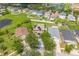 This aerial view showcases a lovely home with solar panels, a spacious yard, and a serene neighborhood at 11130 Summer Star Dr, Riverview, FL 33579