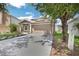 Charming single-Gathering home featuring a two-car garage, well-manicured lawn, and solar panels for energy efficiency at 11130 Summer Star Dr, Riverview, FL 33579