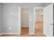 Bedroom closet features white shelving and access to other rooms at 11412 Alden Ct, Hudson, FL 34667