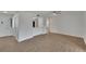 Bright and airy living room showcasing hardwood floors and an open layout at 1207 Chevy Chase Dr, Sun City Center, FL 33573