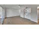 Bright and airy living room showcasing hardwood floors and an open layout at 1207 Chevy Chase Dr, Sun City Center, FL 33573
