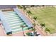 Scenic view of the shuffleboard courts with covered areas and seating for players at 1207 Chevy Chase Dr, Sun City Center, FL 33573