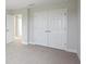 Bedroom with double closets, neutral carpet, and fresh paint at 12758 Oak Hill Way, Parrish, FL 34219