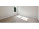 Bedroom with neutral carpet, fresh paint, and a window at 12758 Oak Hill Way, Parrish, FL 34219